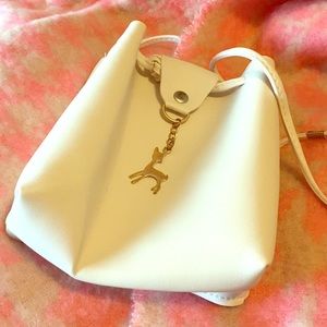 White bag with deer charm